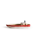 Small wooden boat with red,gray, and black paint by Ryuji Mitani on a white background