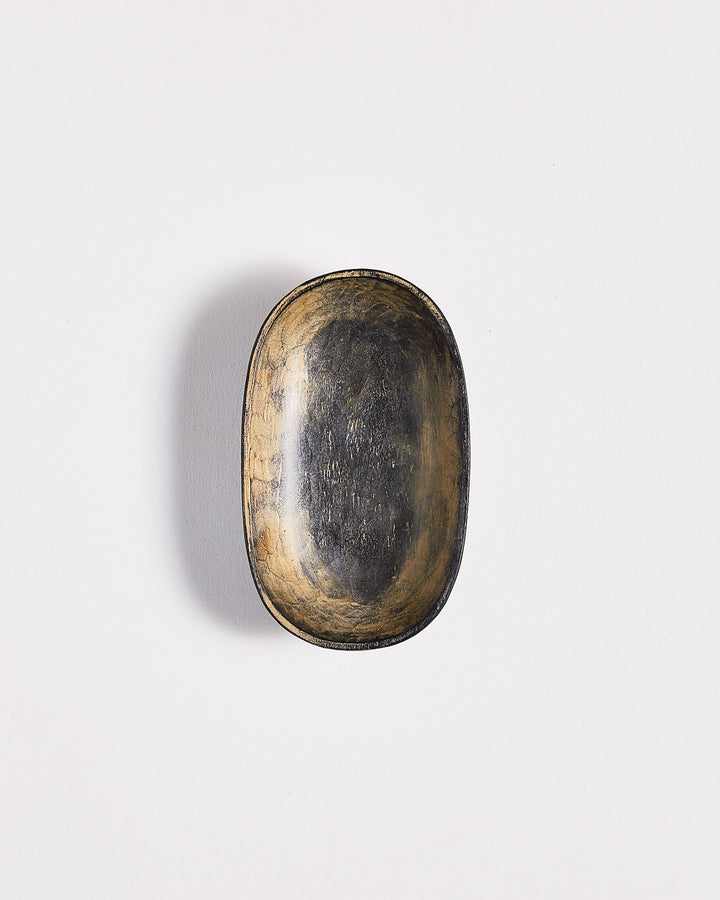 Top vertical view of Small Shallow Usuzumi Oval Bowl by Ryuji Mitani against white-gray background. Variation of brushstroke.