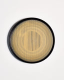 Top view of Usuzumi Round Oak Tray by Ryuji Mitani against white-gray background. Variation of brushstroke. 