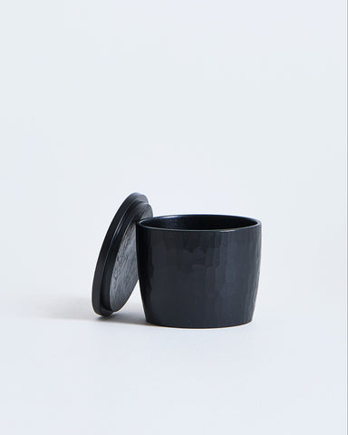 Black wooden cup with lid by Ryuji Mitani on a white background