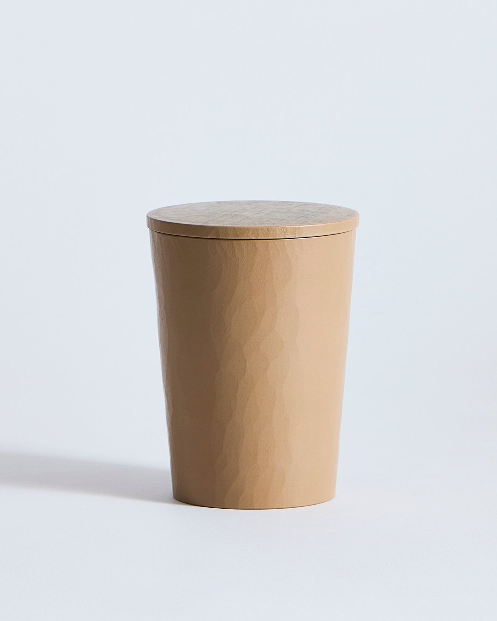 Wooden cup with a lid on cup by Ryuji Mitani  on a white background