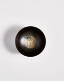 Top view of Usuzumi Black Walnut Bowl by Ryuji Mitani against white-gray background. Variation of brushstroke. 