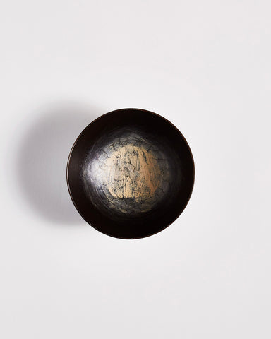 Top view of Usuzumi Black Walnut Bowl by Ryuji Mitani against white-gray background. Variation of brushstroke. 