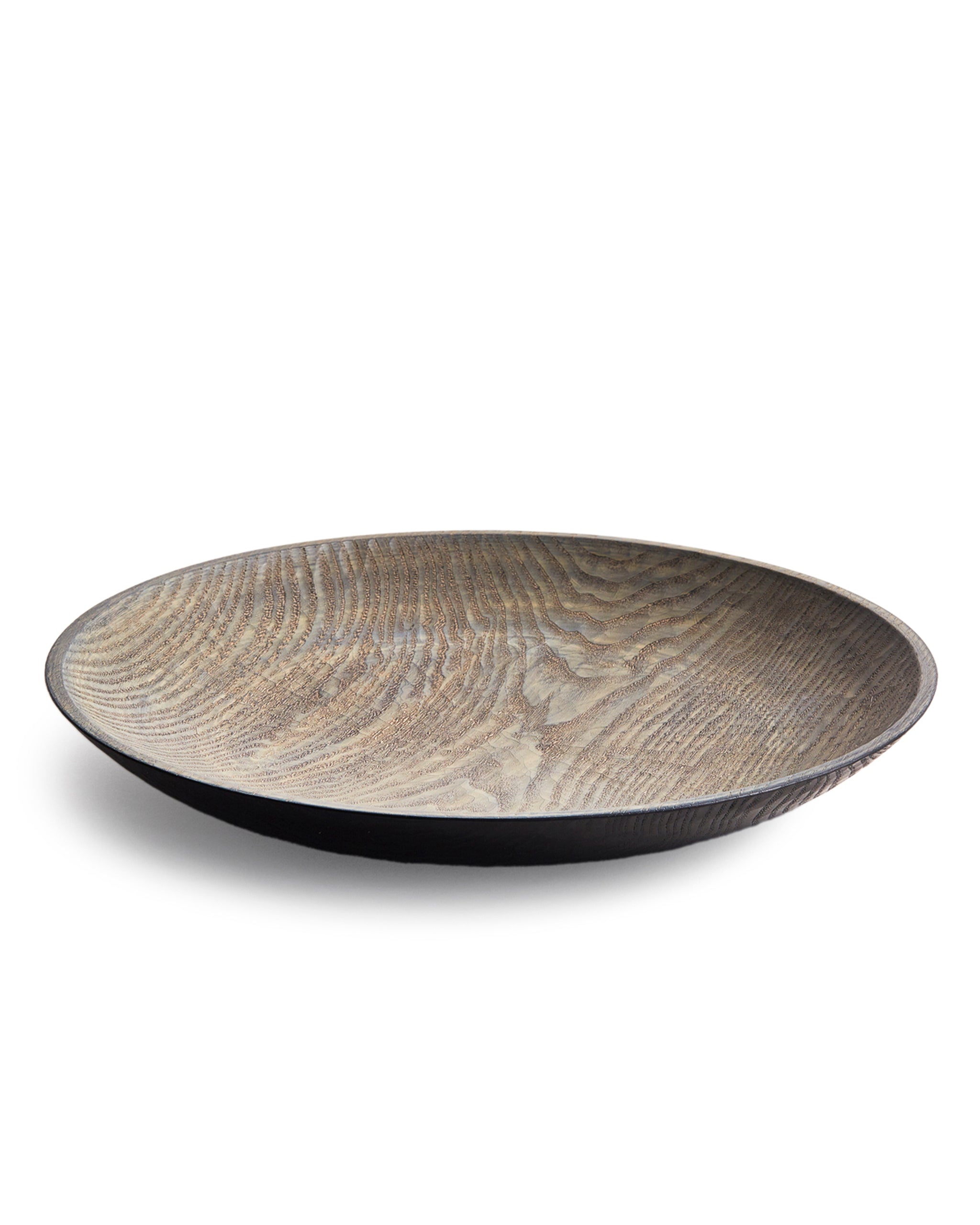 Round wooden bowl with a textured surface by Ryuji Mitani on a white background