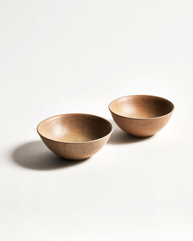 Angled view of White Urushi Baby Bowl Set, side-by-side, by Ryuji Mitani against white-gray background.