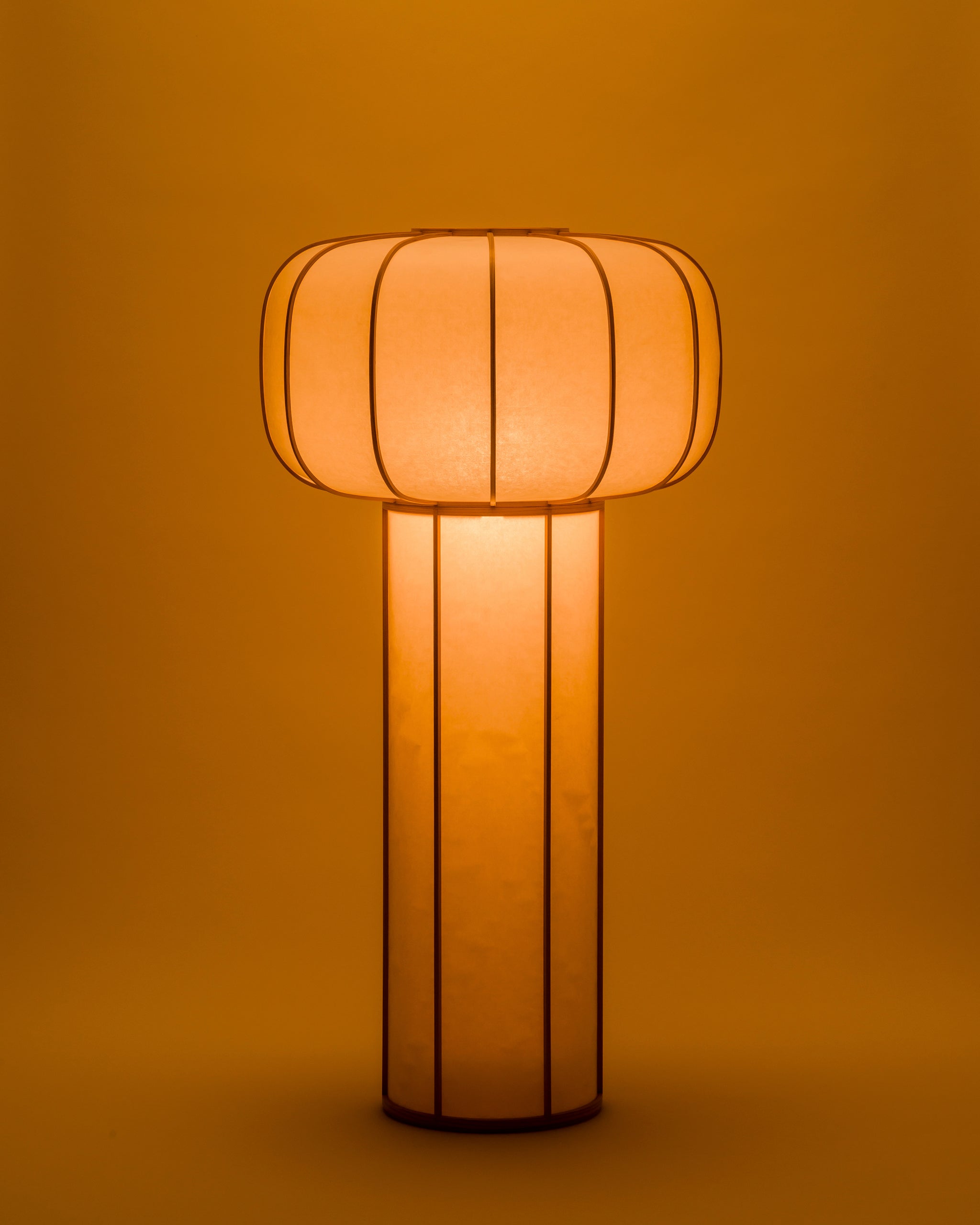 Kiko no hana Lamp in Large by Time and Style with light on on a white background