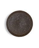 A brown textured plate against white background.