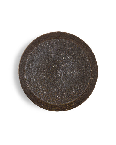 A brown textured plate against white background.