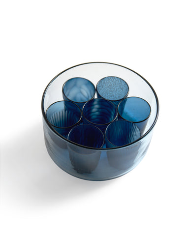Angled top view of the reclaimed blue 'nature's diary' glass set without a lid against white background.