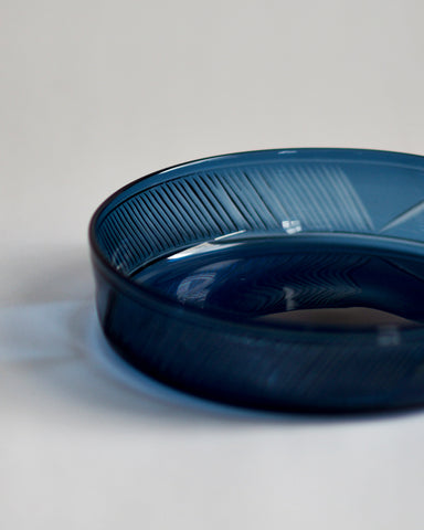 Cropped detail image of the dark blue reclaimed blue schale.