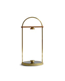 Silhouetted futagami brass paper towel holder with the wood towel holder on top.