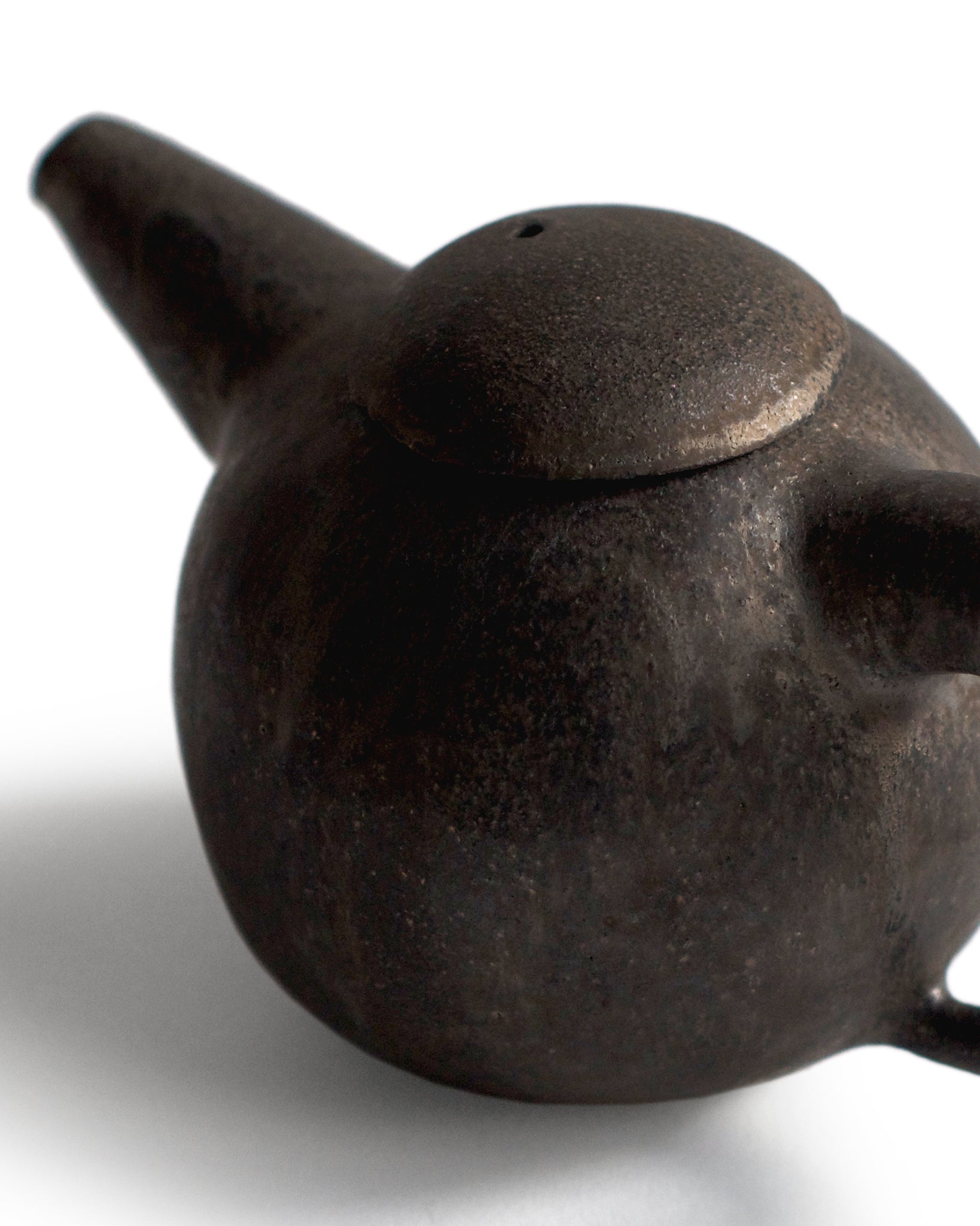 Detail of texture of Black Ceramic Teapot by Keisuke Iwata