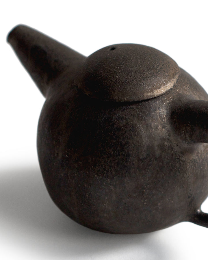 Detail of texture of Black Teapot handcrafted by Keisuke Iwata