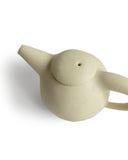 Detail of top view of beige teapot by Keisuke Iwata
