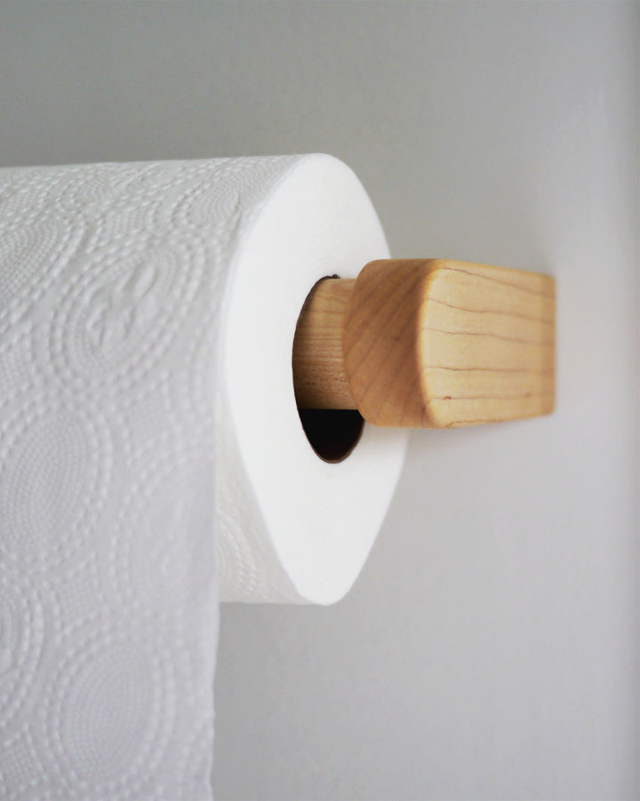 Maple Wood toilet paper holder designed by Makoto Koizumi in context with toilet paper roll