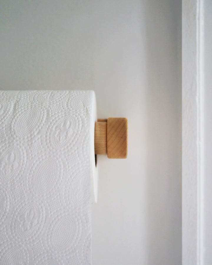 Maple Wood toilet paper holder designed by Makoto Koizumi in context with toilet paper roll