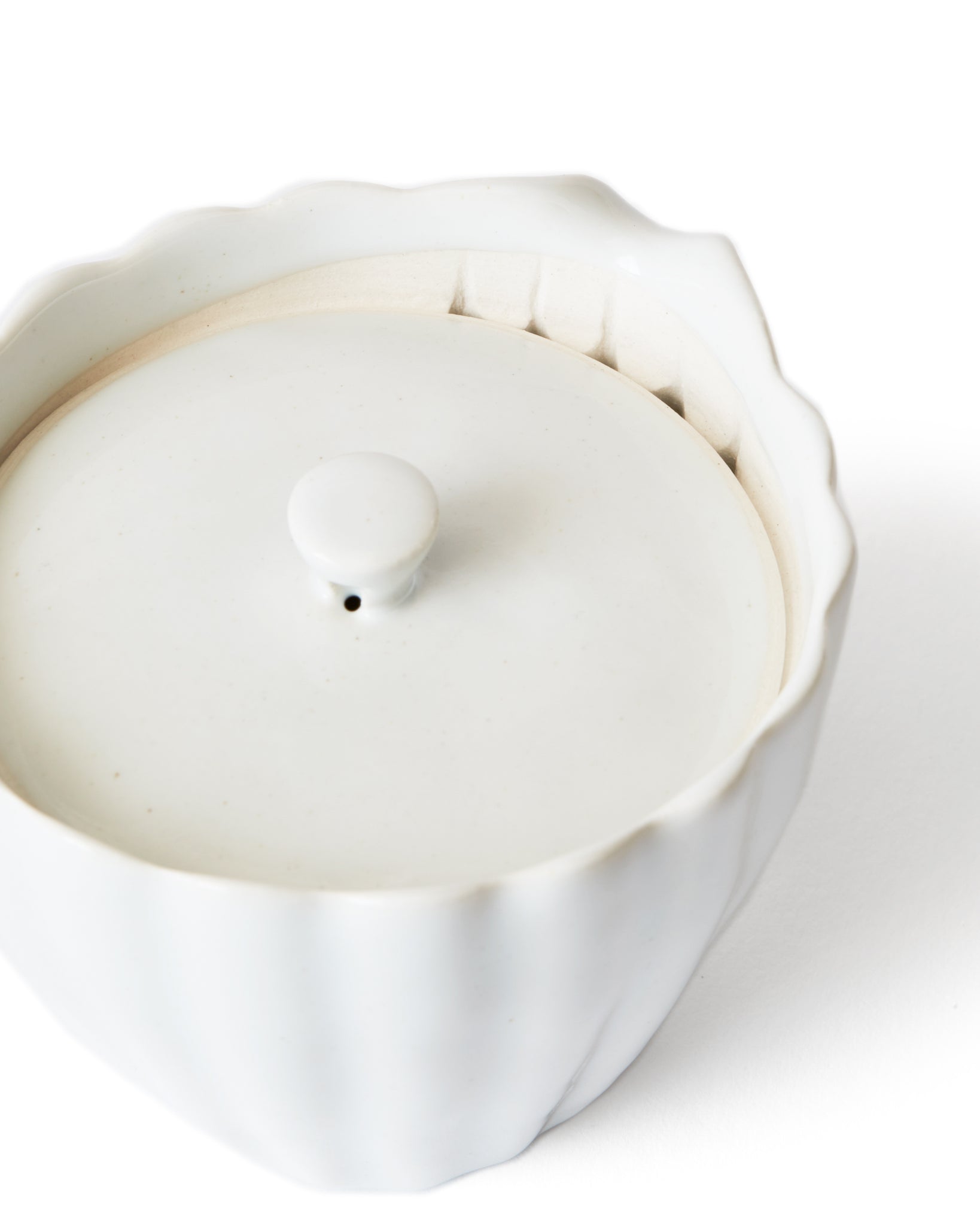 Detail of strainer from above with lid of Chrysanthemum Teapot