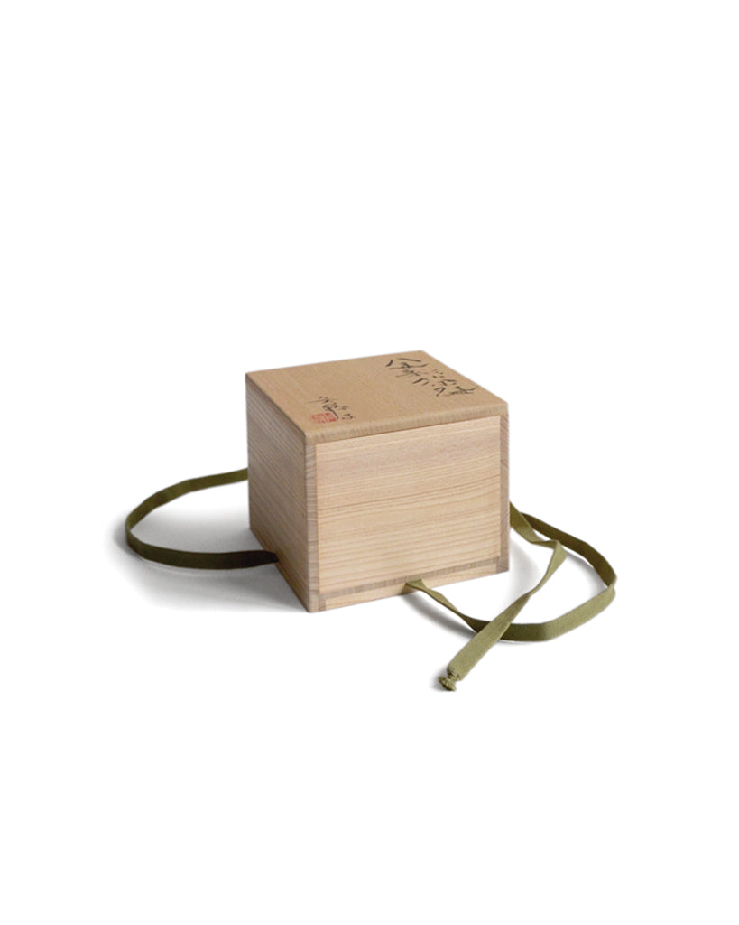 Wooden Box for the Gold Chawan III with Masanobu Ando's calligraphy on the lid. Olive ribbon is attached on the box to wrap around.