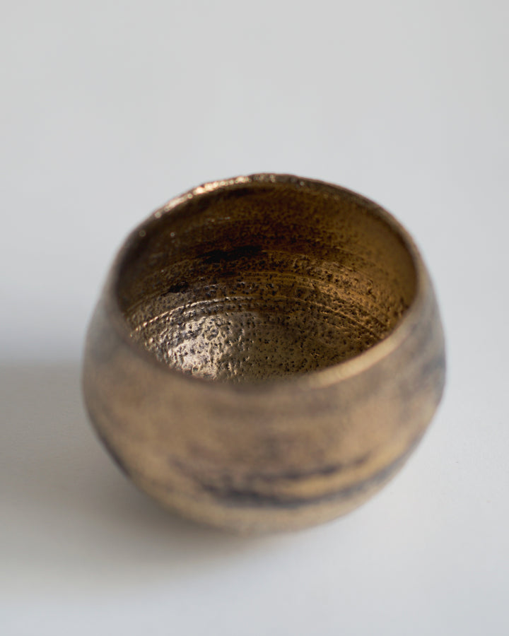 View of the Gold Chawan V from the top against gray background.
