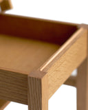 Detailed image of the Keepsake Kids Chair showing the wood joinery and finishing.