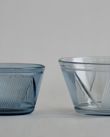 Cropped detail of the small and large reclaimed blue bowl next to each other.  featuring signature 'Factory Zoomer x Nalata Nalata' cut glass pattern. 