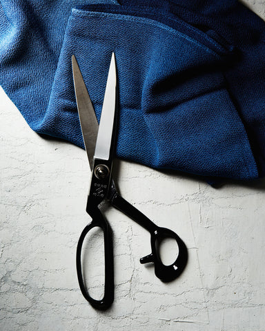 scissors cutting fabric