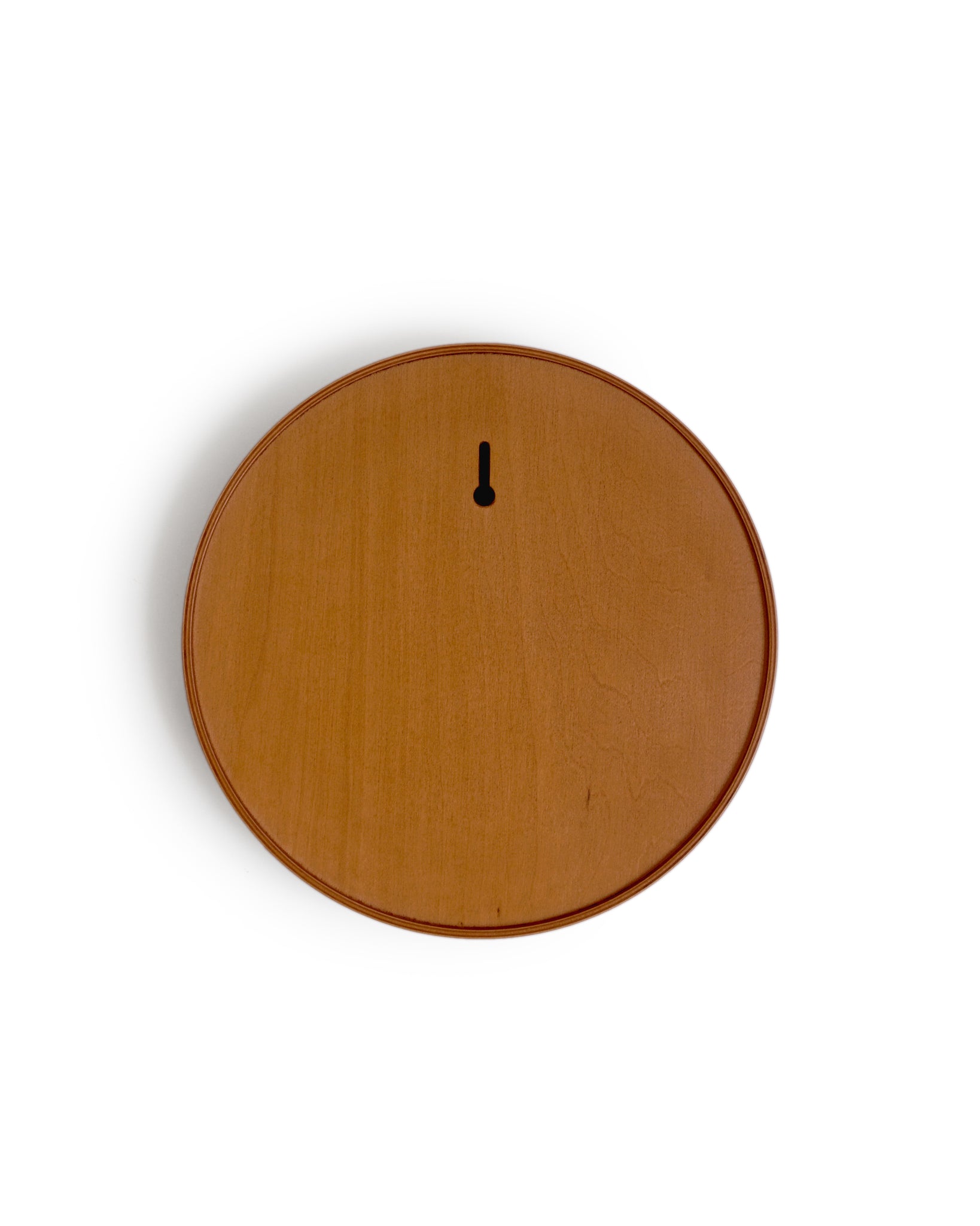 Back of Ayous wood mirror silhouetted against white background