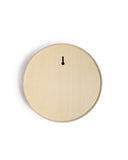 Back of White Oak Wood Round Mirror by Saito Wood Co for Nalata Nalata silhouetted hanging against white