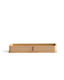 Silhouetted image of the rectangle cedar tray against white background.